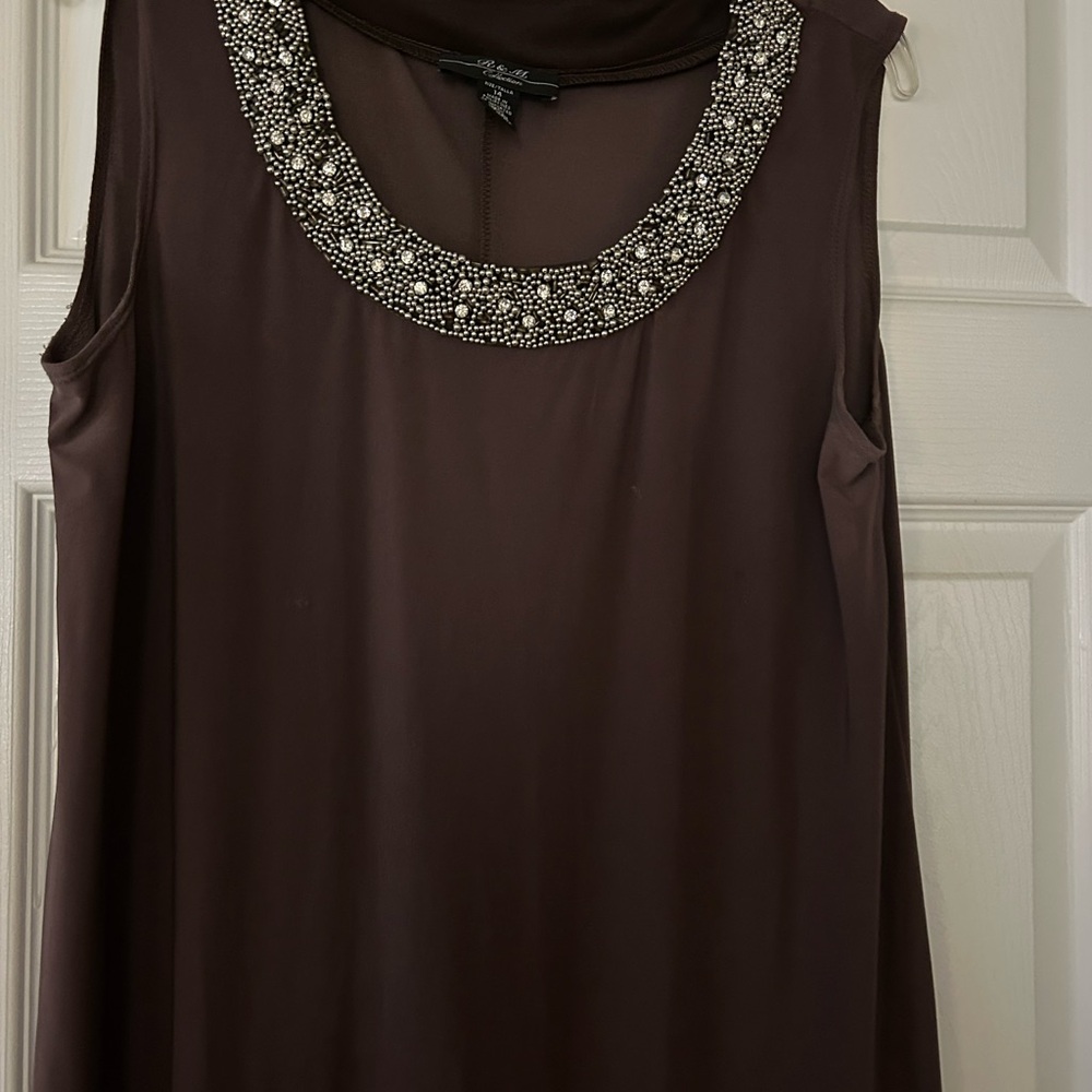 Elegant Brown Sleeveless Top with Embellished Neckline